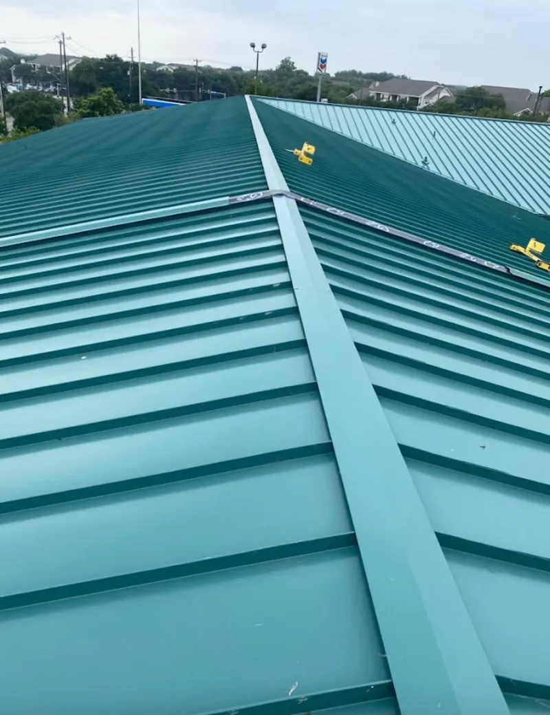 Green commercial metal roof ridge and valley for Metal Roof Repair in Dorr
