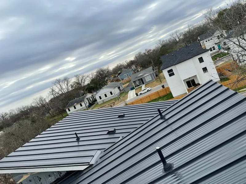 Standing seam metal roof panels with vents for Skylight Repair in Dorr